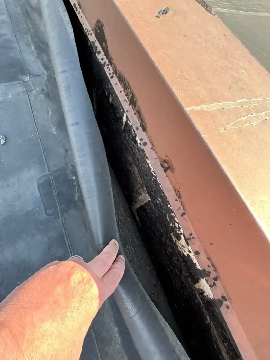 Tarping and dry-in on a Market East commercial roof
